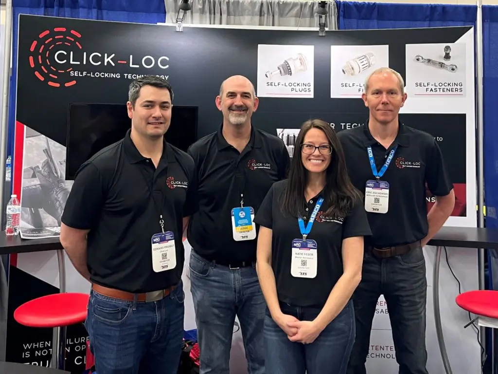 Moeller Aerospace team in front of their Click-Loc booth at the 2022 Aviation Week MRO Americas